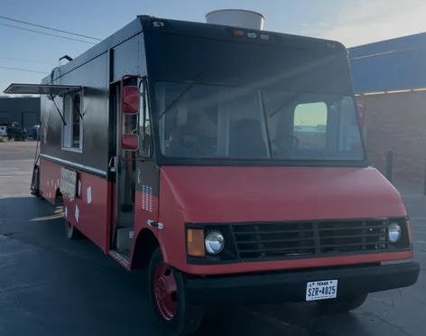The Chicoco food truck, red and black with white diamonds